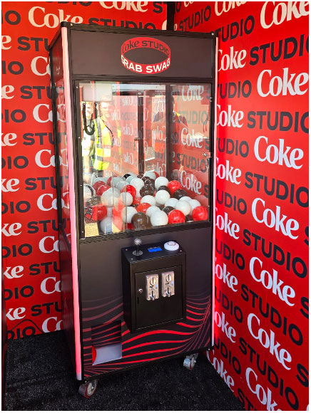 Coke Studios Custom Prize Grabber Machine for hire